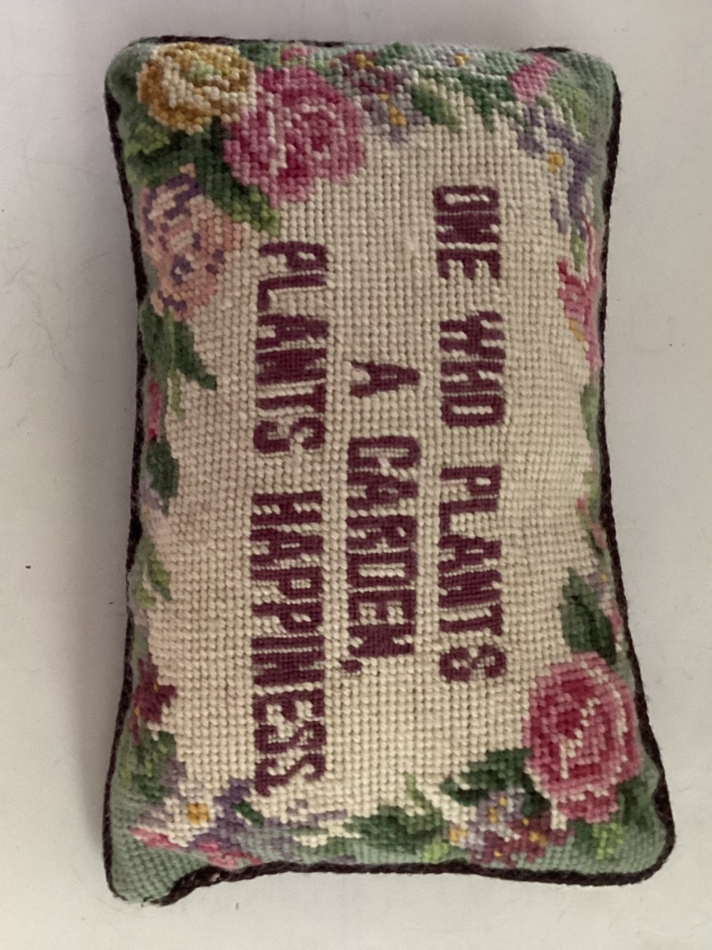 Needlepointed pillow with garden happiness theme approx. 6 x 10 inches